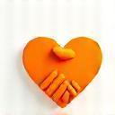 Donation icon with a heart and hand